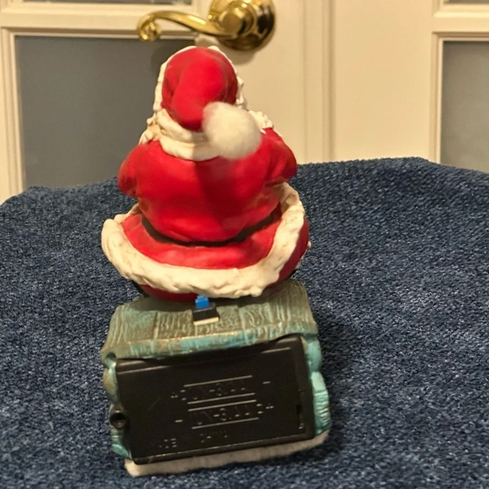 Musical vibrating Santa on his sleigh. Plays 3 songs!